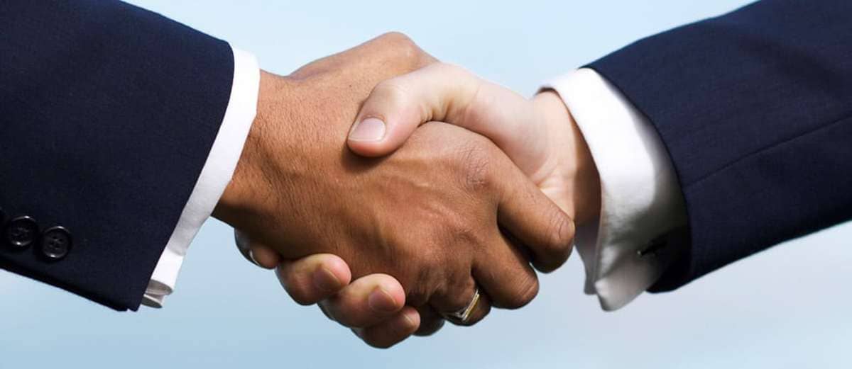Two people shaking hands